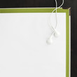 Earphones and blank paper on file