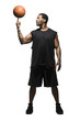 Studio shot of basketball player balancing ball on finger