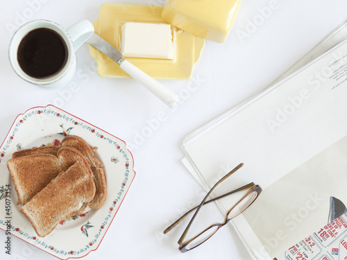 Photo: "USA, California, San Franciso, overhead view of breakfast and newspaper" "USA, California, San Franciso, overhead view of breakfast and newspaper"