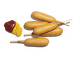 "Corndogs with ketchup and mustard, view from above, studio shot"