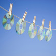 DVDs hanging on washing line