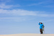 "USA, Utah, Little Sahara, man with skiwear standing in desert"