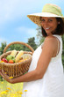 portrait of a woman with fruit basket