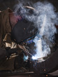 "USA, Utah, Orem, man welding metal"
