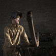 "USA, Utah, Orem, male welder in workshop"