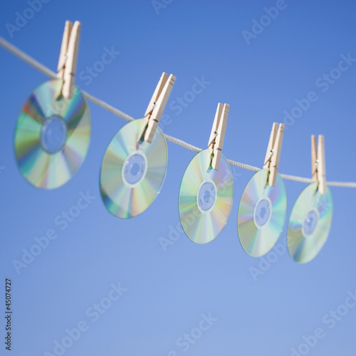 Photo: DVDs hanging on washing line DVDs hanging on washing line