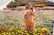 "USA, Utah, Salem, portrait of girl (8-9) in flower field"