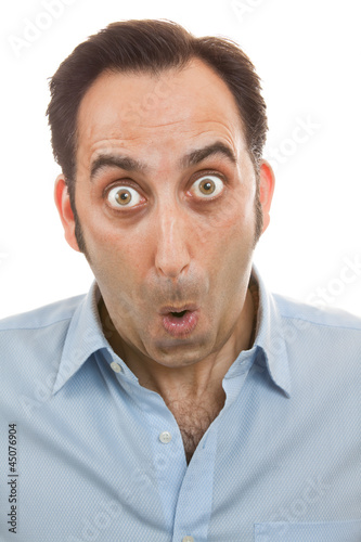 Photo: Surprised man portrait isolated on white Surprised man portrait isolated on white