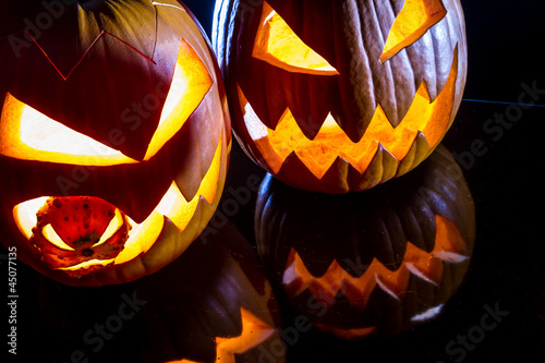 Photo: Close-up of two pumpkins for Halloween Close-up of two pumpkins for Halloween