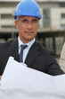 Senior architect working on-site