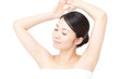 Beautiful young woman on white background. Portrait of asian.