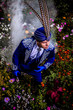 Photo: Man in expensive dark blue suit of illusionist Man in expensive dark blue suit of illusionist
