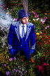 Photo: Man in expensive dark blue suit of illusionist Man in expensive dark blue suit of illusionist