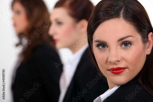 Photo: Businesswoman at a meeting with her colleagues Businesswoman at a meeting with her colleagues