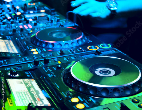 Photo: Dj mixes the track Dj mixes the track