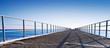 Pier perspective on Black Sea coast. Russia, Sochi, Adler.
