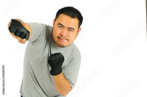 Photo: Man punch in body combat Man punch in body combat