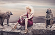 Blond beauty posing with monkeys