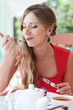 Foto: female eating dessert with pleasure female eating dessert with pleasure