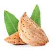 Group of almond nuts with leaves. Isolated on a white background