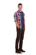 young man with hands tucked in pockets