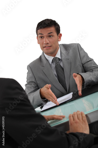 Photo: Businessmen negotiating Businessmen negotiating