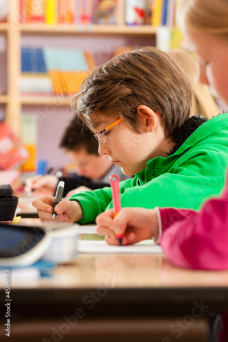 Photo: Education - Pupils at school doing homework Education - Pupils at school doing homework