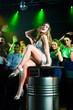party people dancing in disco or club