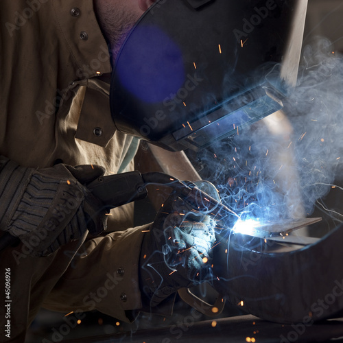 Photo: "USA, Utah, Orem, welder working " "USA, Utah, Orem, welder working "