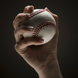 Young woman's hand holding baseball