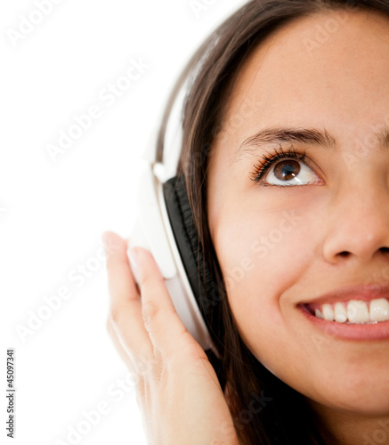 Photo: Woman listening to music Woman listening to music