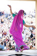 Photo : "USA, Utah, Spanish Fork, rear view of mid adult dancer in traditional clothing performing on stage" "USA, Utah, Spanish Fork, rear view of mid adult dancer in traditional clothing performing on stage"