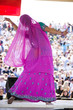 Photo : "USA, Utah, Spanish Fork, rear view of mid adult dancer in traditional clothing performing on stage" "USA, Utah, Spanish Fork, rear view of mid adult dancer in traditional clothing performing on stage"