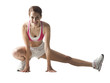 "Young woman stretching, studio shot"