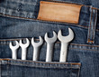 Wrenches in blue jeans pocket