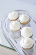 "USA, California, San Francisco, cupcakes with frosting on silver plate"