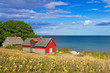 Photo: Traditional red Swedish cottage house at Baltic Sea Traditional red Swedish cottage house at Baltic Sea