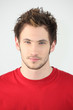 portrait of young man with neutral expression