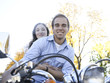 "Provo, USA, Utah, Young couple on motorcycle"
