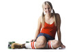 Portrait of young woman wearing roller skates