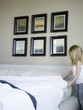 "USA, Utah, Provo, Girl (4-5) making bed"