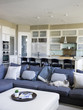"USA, Utah, Provo, Cat relaxing on sofa in luxury home"