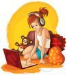 A little girl working and listening music on laptop