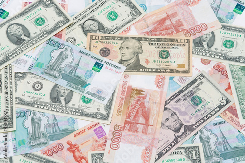 Photo: U.S. dollars and Russian rubles U.S. dollars and Russian rubles