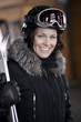 Portrait of mature woman going skiing