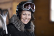 Portrait of mature woman going skiing