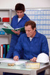 Manual workers in an office