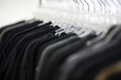 USA, Utah, Salt Lake City, Suits hanging on rail
