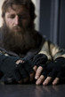 USA, Utah, Salt Lake City, Man in winter clothing, focus on hands in foreground