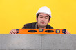 Tradesman using a bubble level